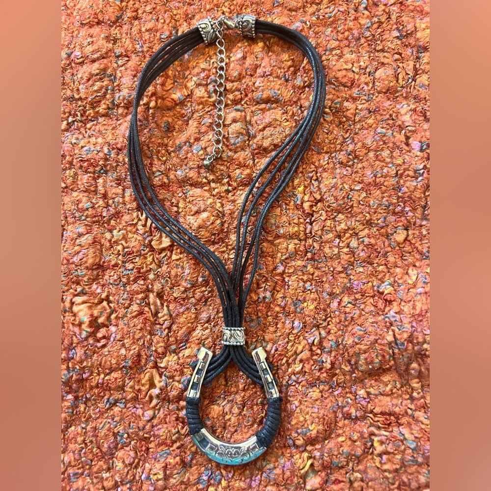 Western wear lovers!!  Multi-leather strand necklace with horseshoe pendant.